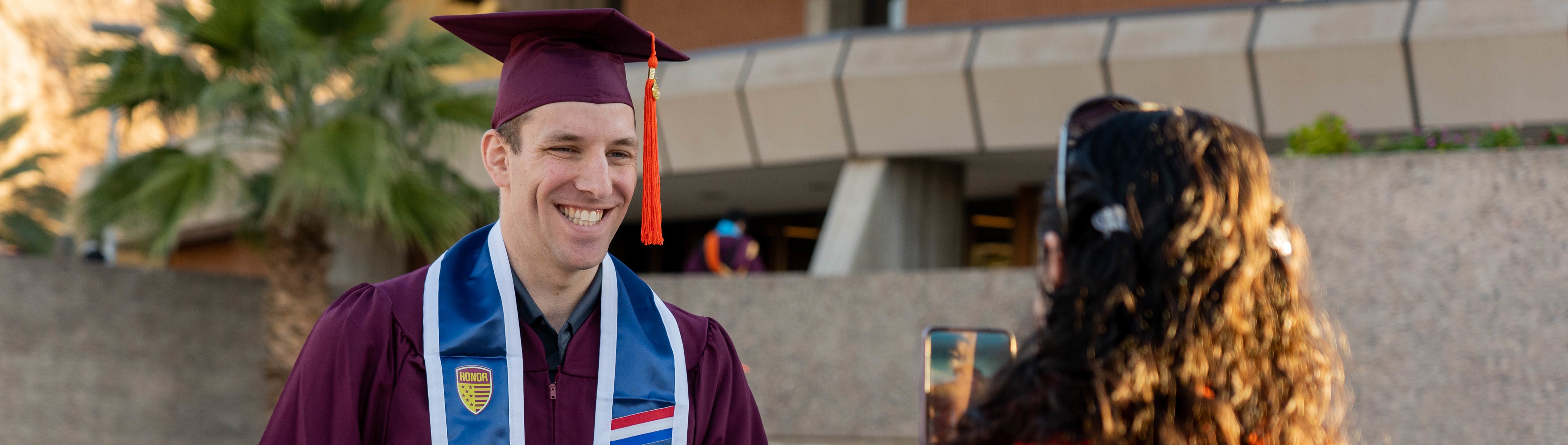 Student in cap and gown